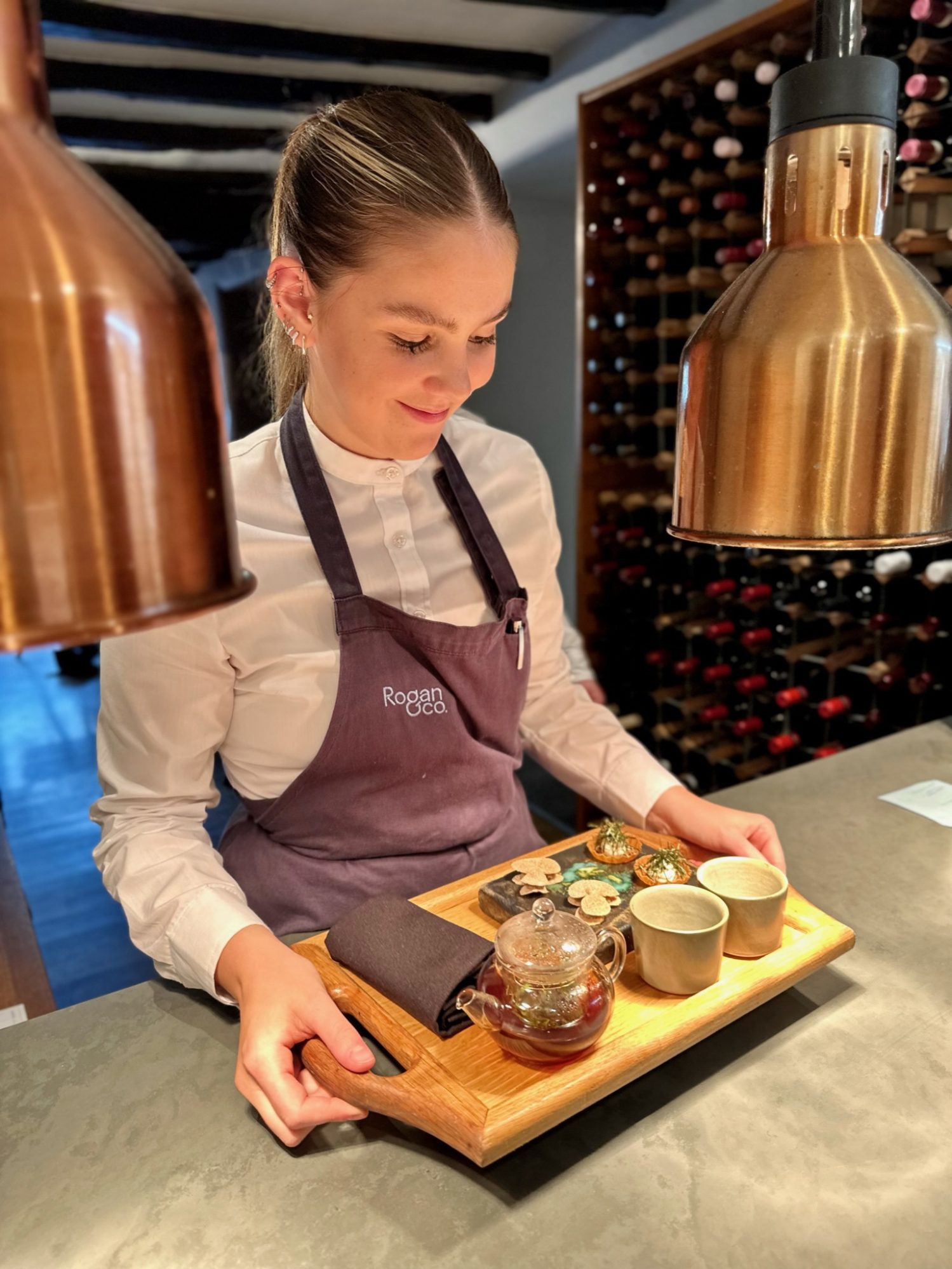 Maddie Bates R Ogan Co Service on the pass